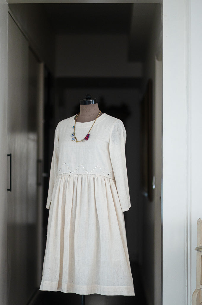 Boston, Off White Organic kala Cotton Dress with Hand Embroidered Mirror Work